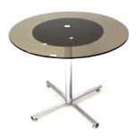 A smokey glass circular topped dining/breakfast table.