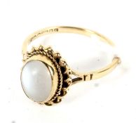A 9ct gold ring single moonstone dress ring size P, 2.5 grams.