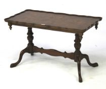 An early 20th century bur wood coffee table.