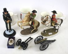 An assortment of military ceramics and collectables.