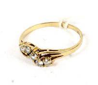 9ct gold faux diamond ring with cross over setting size O,