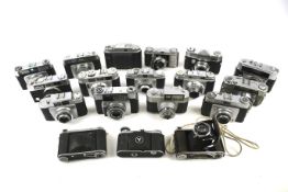 A collection of eighteen cameras.