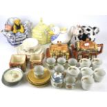 An assortment of novelty teacups and teapots.
