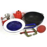 An assortment of kitchenalia. Including enamel pans, a cast iron pan, vintage mincer etc.