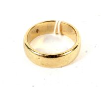 A 9ct gold plain wedding band size T, 9.1 grams.