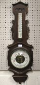 An Edwardian B & A Butterfield barometer.