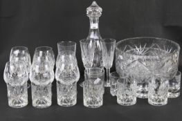 A cut glass decanter H33cm, with eight brandy balloon glasses, whisky tumblers,
