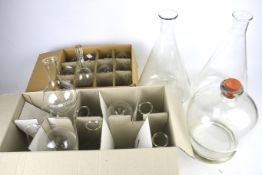 An assortment of scientific glassware.