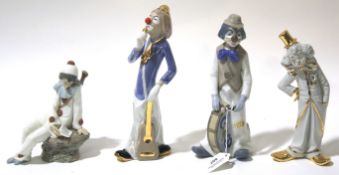 Four ceramics figures of clowns in various poses including a NAO,