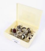 Twenty assorted silver and white metal dress rings, various designs some set with stones.
