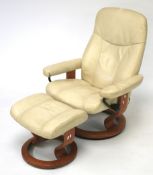 An Ekornes Stressless reclining open arm lounge chair and matching stool.