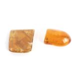 A piece of rounded Baltic amber 21 grams and a small slab of yellow calcite