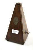 A mahogany cased French metronome.