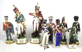 Nine ceramic soldier figures.