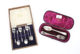 A cased silver spoon and fork set in velvet lined presentation case.