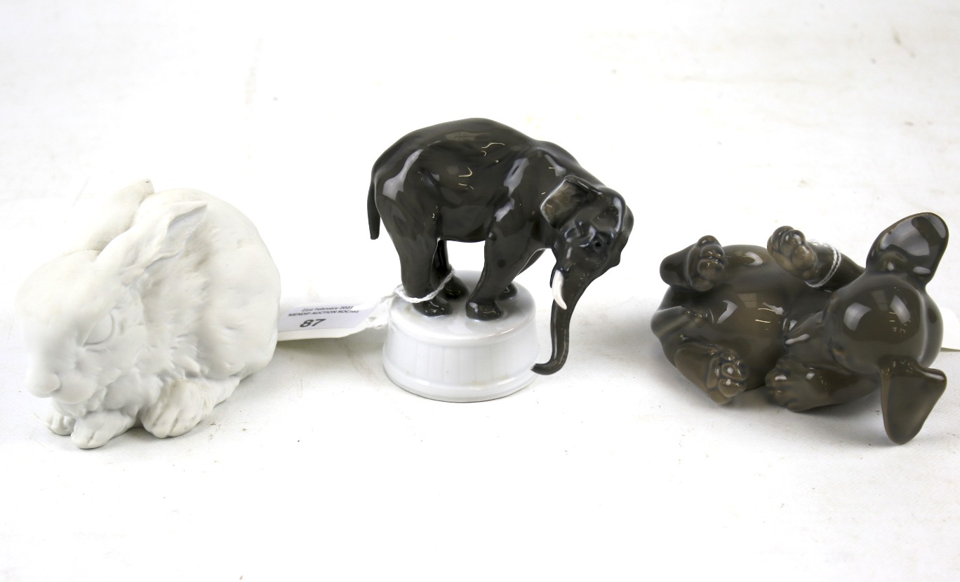 Three ceramic animals.