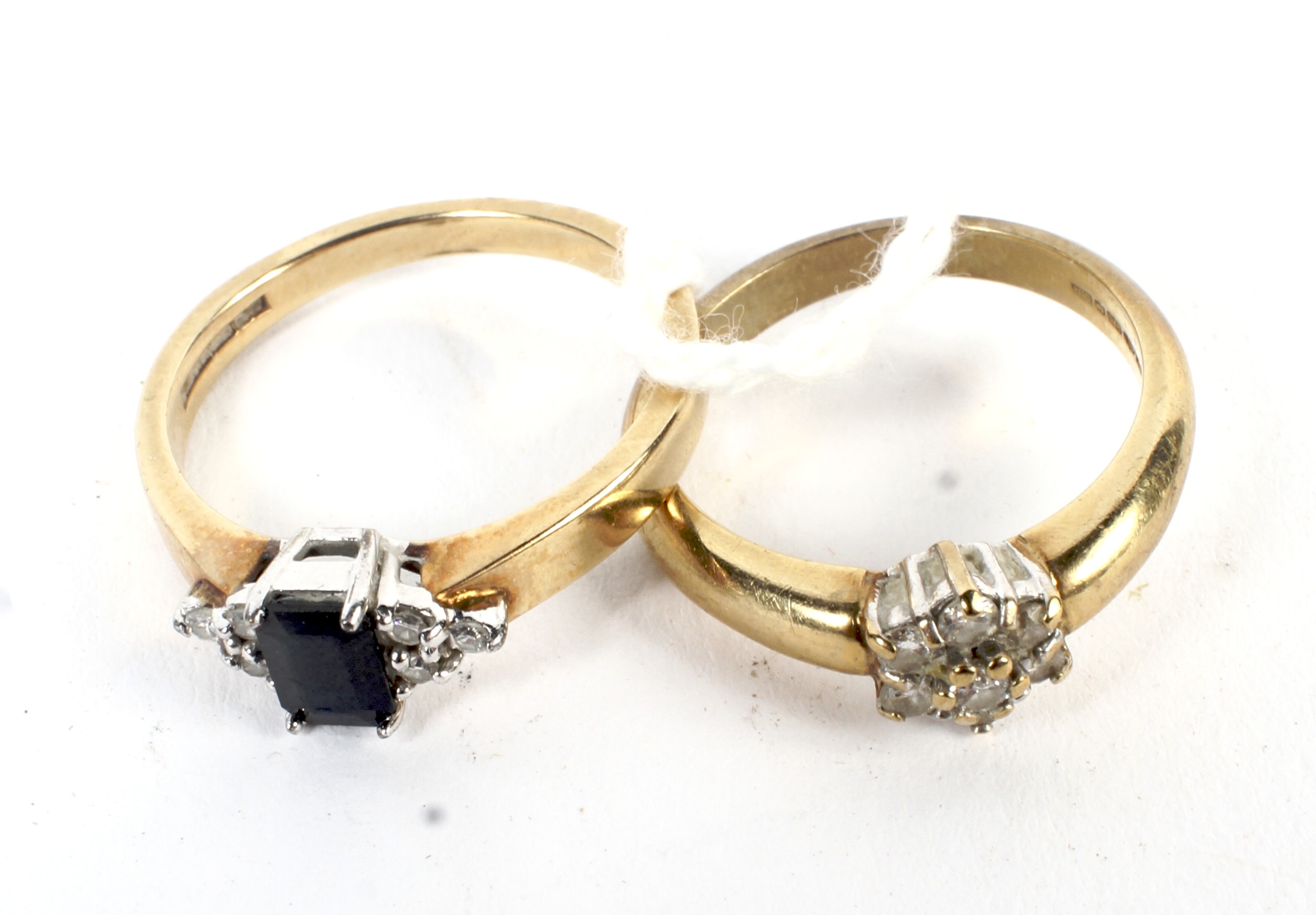 Two 9ct gold and diamond rings.