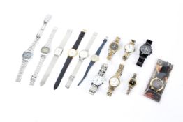 An assortment of ladies and gentleman's wrist watches.