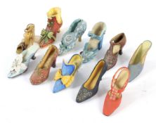 A collection of Willow hall collectors ceramics shoes through the ages 11 in total