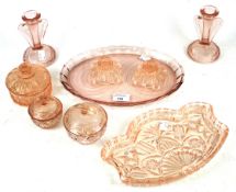 A collection of 20th century pink glassware.