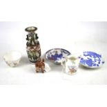 An assortment of ceramics. Comprising a satsuma tripod vase,