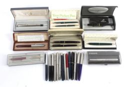 An assortment of fountain pens some vintage various makers, including parker and cased pen sets.