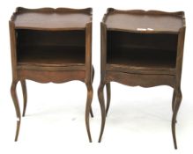 A pair of oak Queen Anne style bedside cabinets.