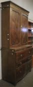 A large 19th century mahogany secretaire bookcase, with inlaid decoration throughout.