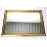 ,A contemporary rectangular bevelled edge wall mirror.