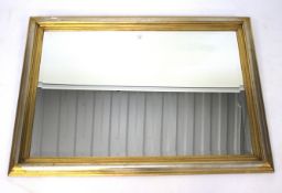 ,A contemporary rectangular bevelled edge wall mirror.