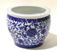 A blue and white oriental jardiniere decorated with flowers, Dia30.5cm x H25.5cm.