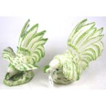 A pair of ceramic roosters.