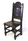 A 19th century carved oak chair.