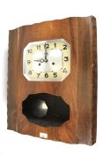 A French Art Deco wall clock by Girod.