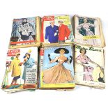 An assortment of seventy five vintage French fashion magazines.