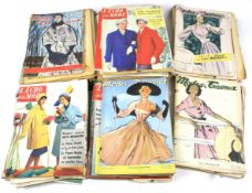 An assortment of seventy five vintage French fashion magazines.