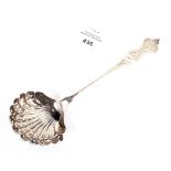 A French silver sugar sifter ladle with shell shaped bowl 36 grams.