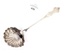 A French silver sugar sifter ladle with shell shaped bowl 36 grams.