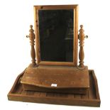 A contemporary pine dressing table mirror and a wooden twin handled tray.