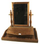 A contemporary pine dressing table mirror and a wooden twin handled tray.
