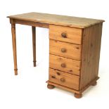 A modern pine single pedestal desk.