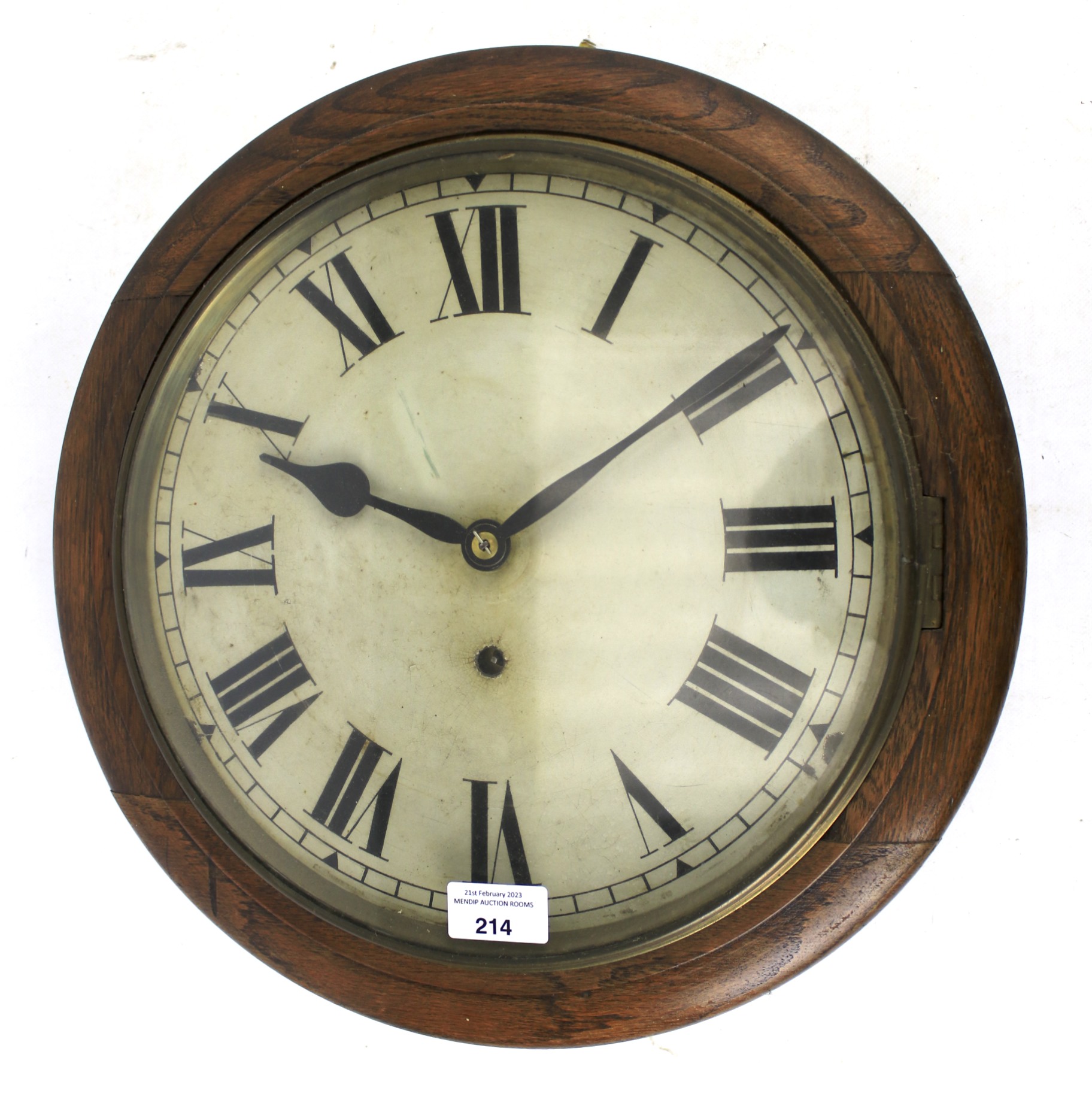 A 19th century circular wall clock.