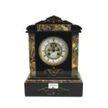 A French slate and marble mantel clock.