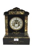 A French slate and marble mantel clock.