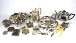 An assortment of silver plated table ware.