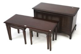 A stag style coffee table with two matching side tables.