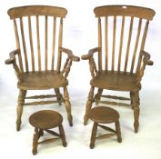 A pair of 20th century lath back kitchen chairs and a pair of contemporary wooden stools.