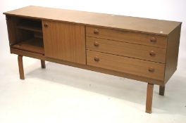 A 1960s teak veneered sideboard.