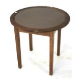 A 20th century oak table. Of circular fo