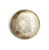 A 1906 shilling coin